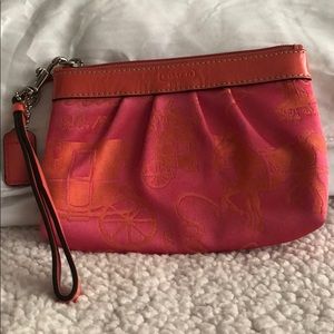 Coral Coach Wristlet